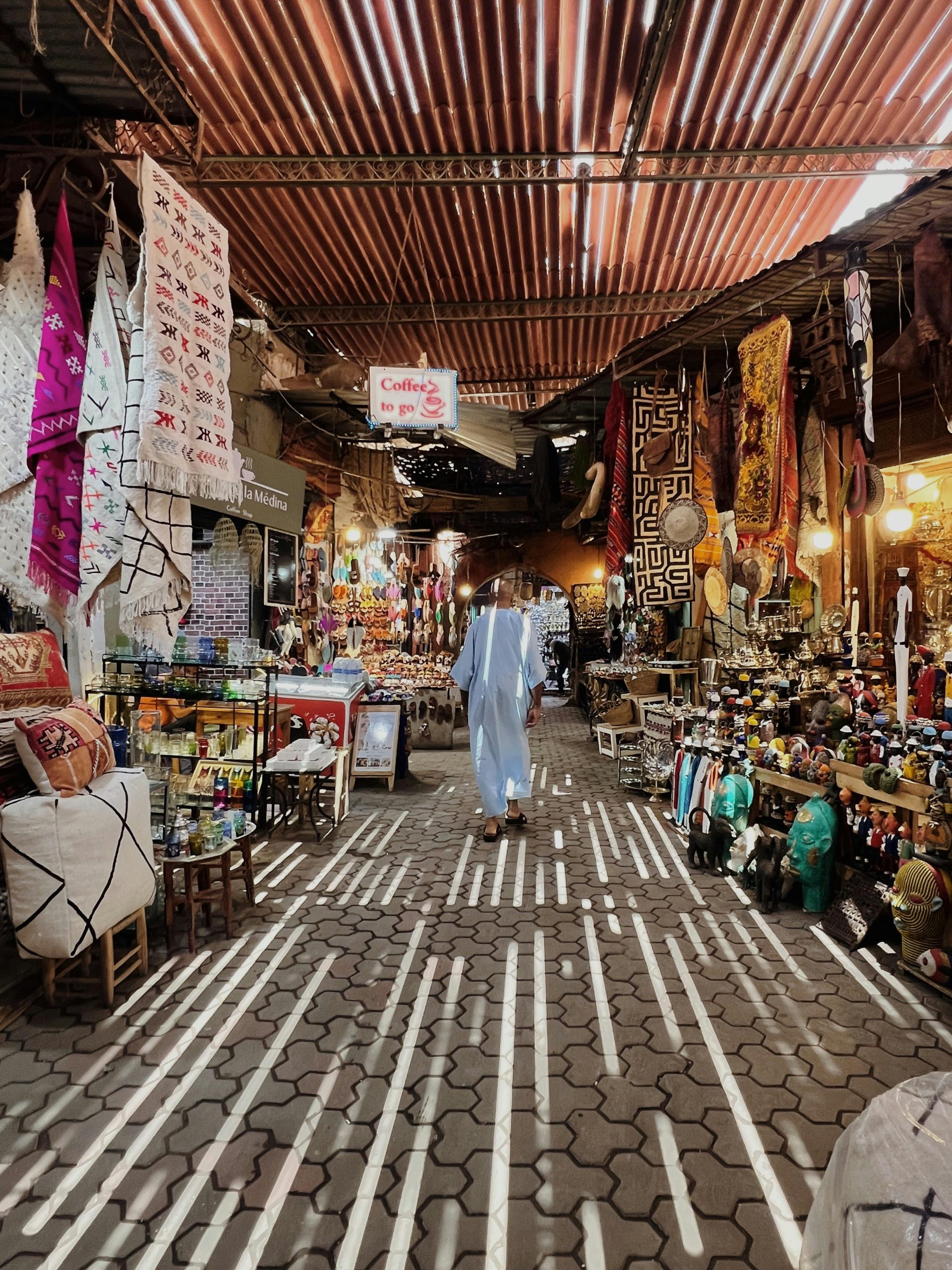 Vibrant Moroccan souk with textiles and crafts